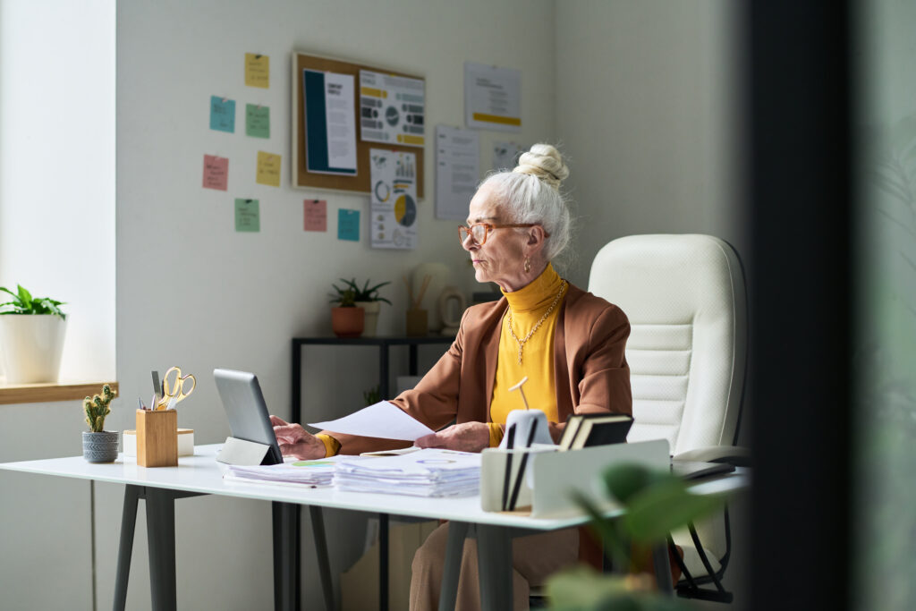 senior woman working in modern home office setting 2026 01 08 23 57 41 utc